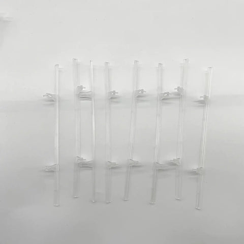 No Hassle Shutter Vane Repair Slider And Tilt Bar Connector Kit For Vinyl Plantation Shutters Slides Right In For 3.25 Inch Center Spacing 30 Piece Reconnect Pack, clear plastic strips on white background.