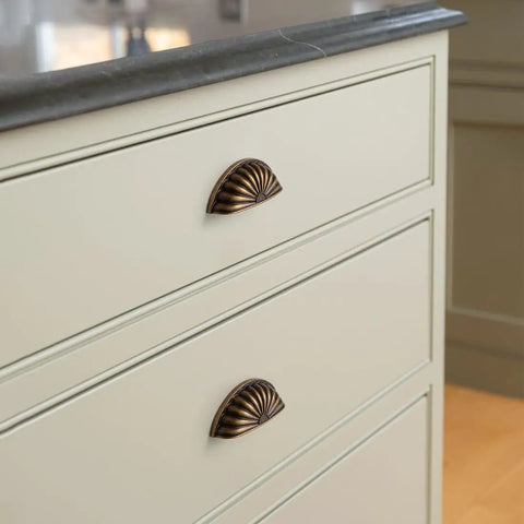 Straight Up 10 Pack Sunflower Cabinet Cup Pulls In Antique Brass Finish With Classic Retro Vibe For Kitchen Drawers And Closets Featuring Three Inch Center Hole Half Moon Shape and tough all metal build on drawer.