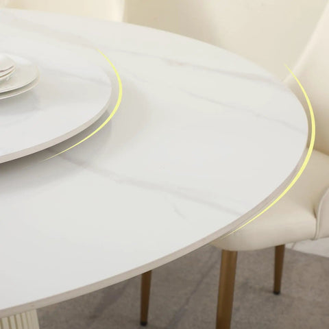Close-up of Top Shelf 7 Piece Round Marble Dining Table Set Featuring An Easy Glide Lazy Susan Turntable and white chairs.