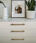 Dresser with vintage antique brass zinc alloy cabinet handles with striped detailing, 128mm center-to-center, corrosion-resistant hardware