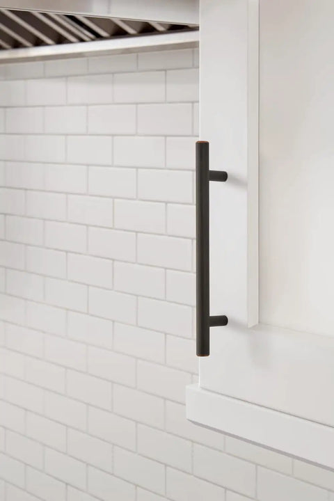 Top Shelf Pro Modern Oil Rubbed Bronze Cabinet And Drawer Pulls on white cabinet, 7 3/8in length, sleek design.