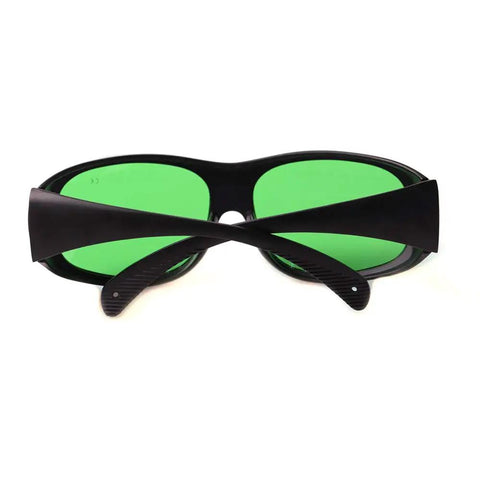 Top Shelf Laser Safety Glasses Delivering Knockout Eye Protection For 635Nm 808Nm And 980Nm Diodes featuring black wraparound frame and green lenses.