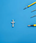 Mini Cross Socket Wrench Kit M2 M2.5 M3 For Rc Model Cars Hobby compact spanner on blue background with other tools.