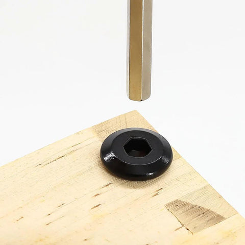 65mm Flat Head Hex Socket Cap Screws 10 Pack Black Coated 304 Stainless Steel M6 6mm Thread 1.0 Pitch With Hex Wrench Included For Binding Posts And Harsh Environments Salt Spray Resistant shown installed on wood with hex wrench above.