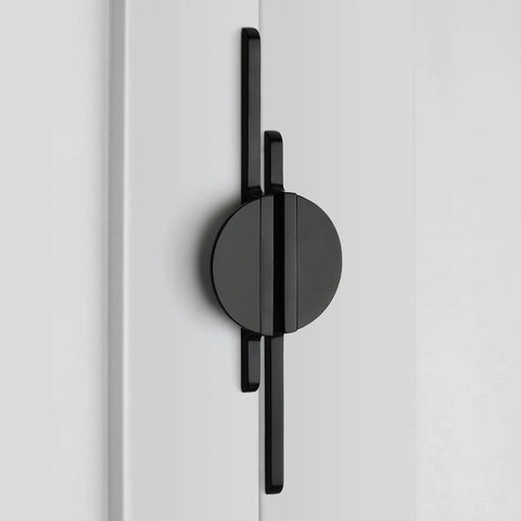 Matte Black Half Moon Cabinet Handles Two Pack With Eleven Inch Hole Center Sleek Zinc Alloy Door Pulls For Kitchen Cupboards And Bedroom Dressers close up view on a white cabinet door.