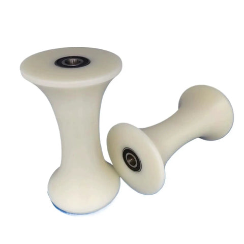 Heavy Duty U Shaped Groove Nylon Pulley With Double Bearing For Rock Solid Sliding Door Track Guide Action And Plastic Roller Rig That Truly Gets The Job Done Right - two white nylon pulleys with dual bearings.