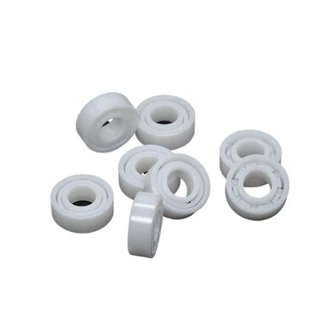 1PC Premium ZrO2 Ceramic Bearing for Spinning and Bait Casting Reels Plastic Outer Ring precision balls laid out.