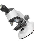 Kid Friendly Microscope Kit With High Definition Magnifier And LED Light for educational science exploration on white surface.