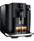 Straight Up Game Changing Automatic Espresso Machine With 2.8 Inch Color Display And Easy Cappuccino Function In Piano Black showcasing sleek design and two cups of espresso.