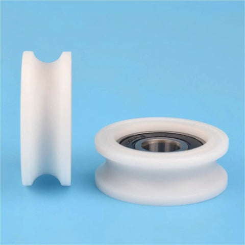 Ten Piece U Groove Plastic Coated Bearing Kit With Slick Nylon Pulley Design Smooth Rotation Tough As Nails Core 6201 Specs 12 By 44 By 16 mm Dimensions Heavy Duty Track Guide Roller Finished In Crisp White showing a white nylon pulley with steel core.
