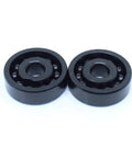 Two Pack 6006 Full Ball Bearings Rock Solid Heat Resistant Up To 500 Degrees Celsius 30X55X13MM black steel design for machinery use.