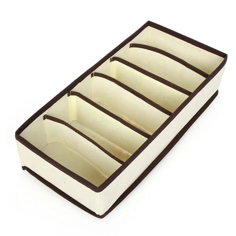 Four Piece Plastic Drawer Organizers With Six Seven Eight Compartments In Warm Beige for easy closet sorting and office cleanup.