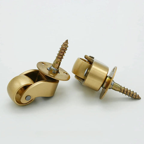 Hella Smooth 360 Swivel Brass Caster Wheels With Slick Vintage Style Built Tough For Heavy Duty Furniture Rollers Simple Bolt Attach Design Handles Two Hundred Kilos Like A Total Champ Daily in brass, showing swivel design and threaded stem.