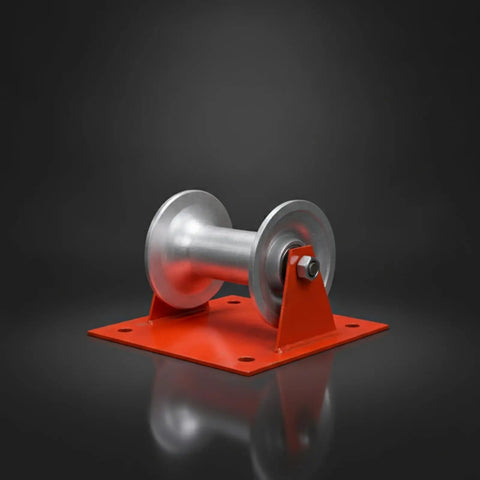 Heavy Duty Cable Guide Wheel With Ground Mount Steel Support Bracket And Slick Aluminum Pulley Roller on red metal base.
