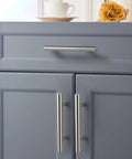 30 Pack Brushed Nickel Stainless Steel Kitchen Cabinet Handles T Bar Pulls Three And A Half Inch Center To Center Six Inch Overall Length Modern Euro Style Cupboard Drawer Pulls For Cabinets Dressers Furniture Hardware installed on gray cabinets