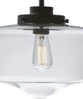 Black Finish Pendant Light With Clear Glass Shade 1 Light Fixture Includes 60W Bulb Easy Connect Installation close-up view.