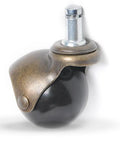 Five Pack Two Inch Antique Brass Swivel Caster Wheels With Built In Brakes Smooth Nylon Rolling Balls close-up view of caster wheel