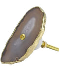 Top Tier Natural Agate Stone Cabinet Drawer Knobs With Gold Plated Edges And Textured Surfaces Sick Decorative Dresser Pulls angled view showing gold trim and screw.