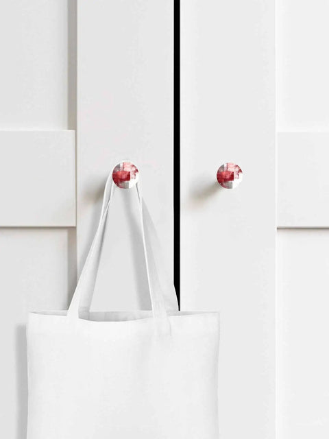 Two Piece Set Top Shelf Solid Beech Wood Round Cabinet Knobs Showcasing Dope Abstract Red And Fresh Sage Green Graffiti Art on white cupboard.
