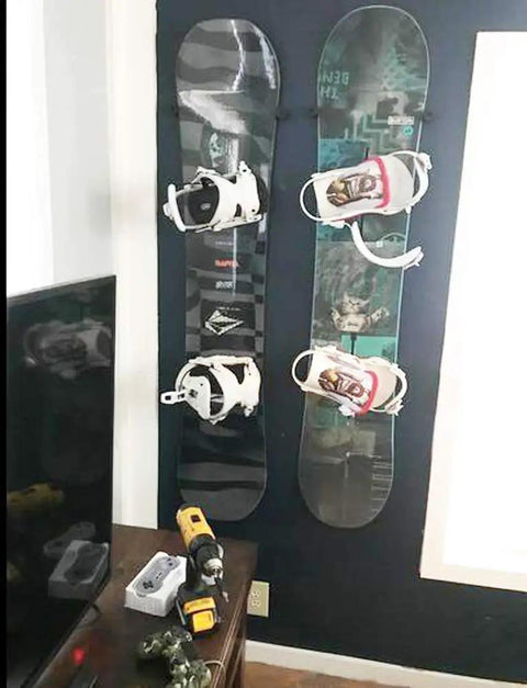 Heavy Duty Snowboard Wall Mount Display Hanger And Ski Storage Rack Featuring Invisible Floating Design, showcasing two boards on wall.