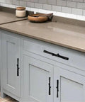 Heavy Duty Black Tree Branch Cabinet Pulls on grey kitchen cabinets, 3 inch drawer handles in rustic twig style.