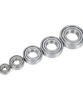 Rock Solid Stainless Steel Miniature Deep Groove Ball Bearing Delivers High Precision Run And Hella Smooth Low Friction Performance With Quiet Operation set of five bearings in various sizes.