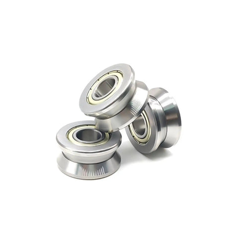 Two Piece V Groove Linear Bearing Replacement With Precision Steel Rollers For Frictionless Shaft Guidance And Steady Rotation In Automation Gear Sized At Twelve By Thirty Nine Point Nine By Eighteen Millimeters, showcasing sealed steel rollers.