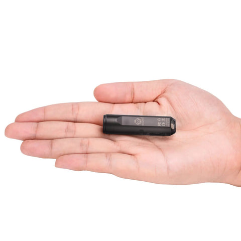 Gen 4 Mini Keychain Flashlight Ultra Bright 650 Lumens USB C Rechargeable EDC Light in hand for size comparison