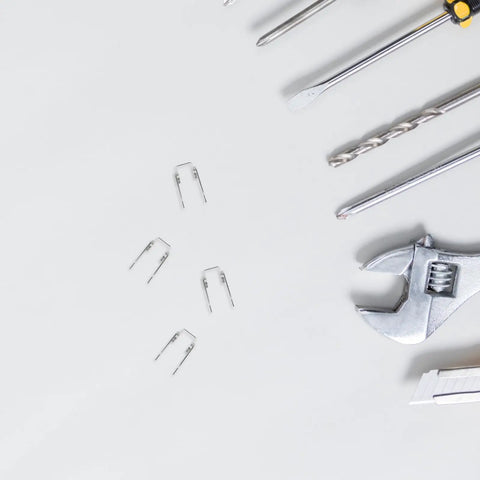 Solid 4pc Kettle Lid Torsion Spring Kit Made From Tough Stainless Steel For Easy DIY Repairs And Total Home Hacks To Fix Loose Lids Fast. stainless steel springs and tools on white background