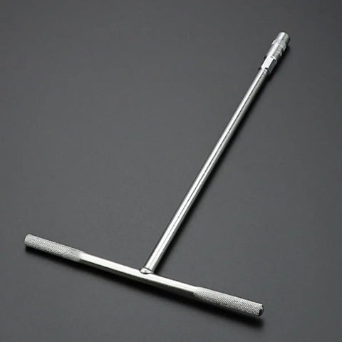 A Real Deal T Handle Socket Wrench Kit With Deep Socket Bore For Heavy Duty Mechanical Maintenance And Quick Garage Fixes That Kick Ass Under Rigorous Daily Shop Conditions, stainless steel tool with non-slip grip.