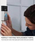 Person installing a video doorbell using Doorbell Screws Replacement Kit With Four Types, 16 Or 20 Piece Set, T16 Short And Long, T5 Short And Long Security Screws For Video Doorbell Cameras, Galvanized Hardened Carbon Steel, A Must Have For Doorbell 2 And Pro Models.
