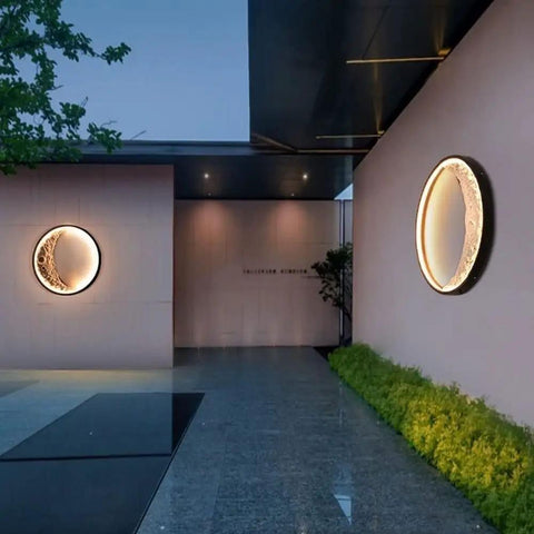 Heavy Duty Moon Wall Lantern Super Waterproof Exterior Porch Light With Warm Led Glow Resin Metal Construction For Villa Patio Backyard Vibes And Chill Atmosphere, mounted on a wall at dusk.
