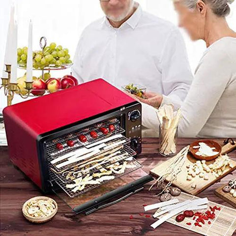 Digital Food Dehydrator With Stackable Trays And Adjustable Heat Timer For Fruit Vegetables And Pet Snacks Electric Drying Machine on kitchen countertop with dehydrating fruits.