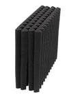 Kickass High Density Soundproof Wall Panels 12 Pack Black Acoustic Foam Wedge Tiles stacked showing beveled edges for noise reduction.