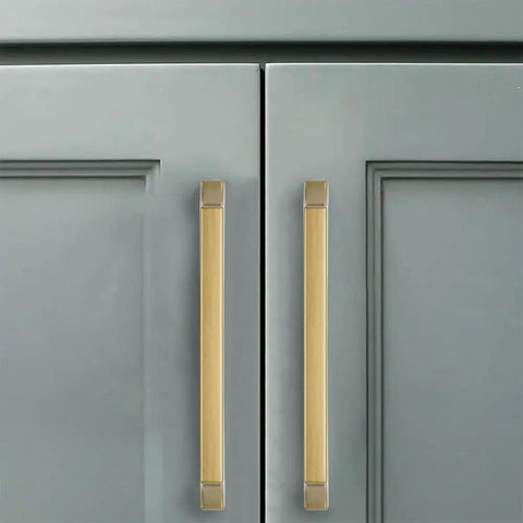 Kickass Zinc Alloy Cabinet Pulls Featuring Slick Brushed Gold Finish For Kitchen Drawers And Bathroom Vanities on gray cabinet doors.