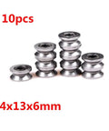 10 Pack 4x13x6mm V624ZZ V Groove Roller Bearing Pulley Wheel Wire Track Guide shown from the side to highlight design and size.