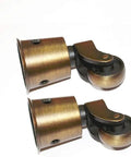 Heavy Duty Solid Brass Furniture Casters Featuring Hella Smooth Silent Swivel Wheels Vintage Round Cup Rollers Glide Hardware For Couches And Tables Light Bronze Finish Three Hole Mount Base Rust Resistant Design close-up view of two casters.