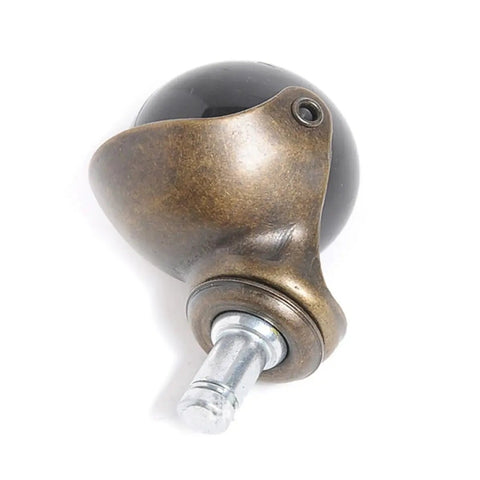 Four Pack Two Inch Ball Caster Wheels Antique Bronze Finish With Lockable Brakes And Buttery Smooth Glide Engineered For Slick Swivel Motion And Floor Friendly Replacement, showcasing a single wheel.