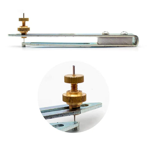 Close-up of the Straight Up Knockout Fit Heavy Duty Vinyl Flooring Scribe Tool showing die cast metal body and sharp tracing mechanism.