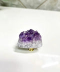 Premium Set Of Two Natural Amethyst Gemstone Cabinet Knobs And Heavy Duty Drawer Pulls Featuring Smooth Purple Crystal Finish To Level Up Your Home Decor Game Today, side view on white background.