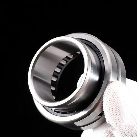 Heavy Duty NA And RNA Series Single Row Needle Roller Bearing engineered for knockout speed, shown from side, premium steel finish.