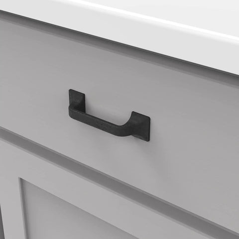 Badass Solid Core Kitchen Cabinet Pulls With Machine Screws, 3 Inch Center To Center Black Iron Finish on drawer.