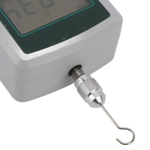 Close-up of Dead Accurate Digital Force Gauge Measuring 0.2N To 2N with interchangeable hook fixture for testing.