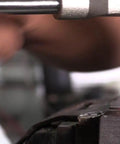Close-up of M10 X 1.5 Carbon Steel Tap Set in use, rethreading damaged threads in metal, DWT Series.