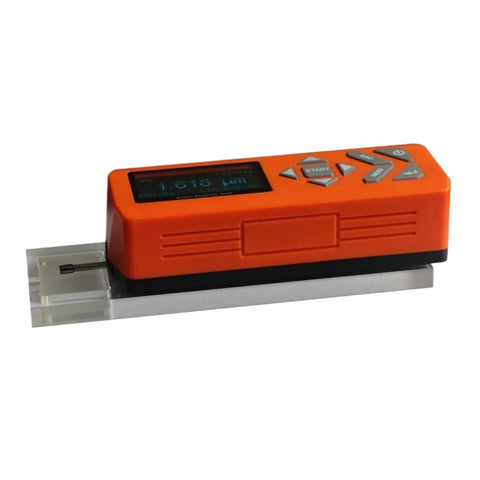Top Shelf Digital Surface Roughness Tester With Crisp LCD Readout And Compact Profile Gauge on clear base measuring surface finish
