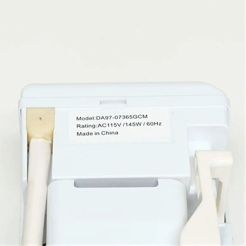 Back view of Icemaker Assembly Replacement DA97-07365G for refrigerator showing model label and white housing.