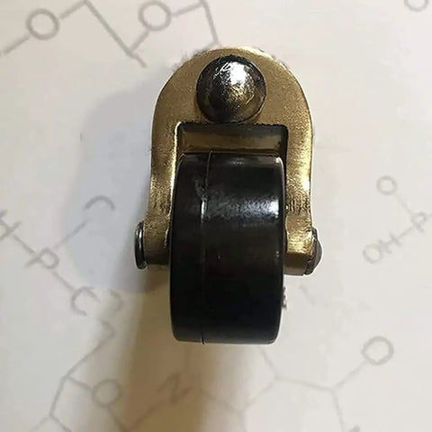 Solid Brass Swivel Castor Wheels With Smooth Rubber Glides For Heavy Furniture Vintage Antique Dining Chair Casters, 25mm wheel close-up.