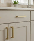 Straight Fire Brushed Gold Cabinet Pulls And Drawer Handles Six Pack Seriously Heavy Duty Metal For Kitchen Cupboards And Closets No Sweat Install Classic Americana Edge showing close-up of brushed gold cabinet handles.
