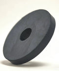 Tough As Nails Natural Rubber Motor Mounts Kick Ass Vibrations From Compressors And Heavy Duty Equipment Easy Bolt Through Installation Boss Grade Damped Pads 8 Pack round black rubber mount with central hole floating on a neutral background.