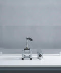 Slick Adjustable Linkage With Ball Joint Rotating Mechanical Assembly And Telescopic Motor Rocker Arm for custom prototyping model kit on workbench.